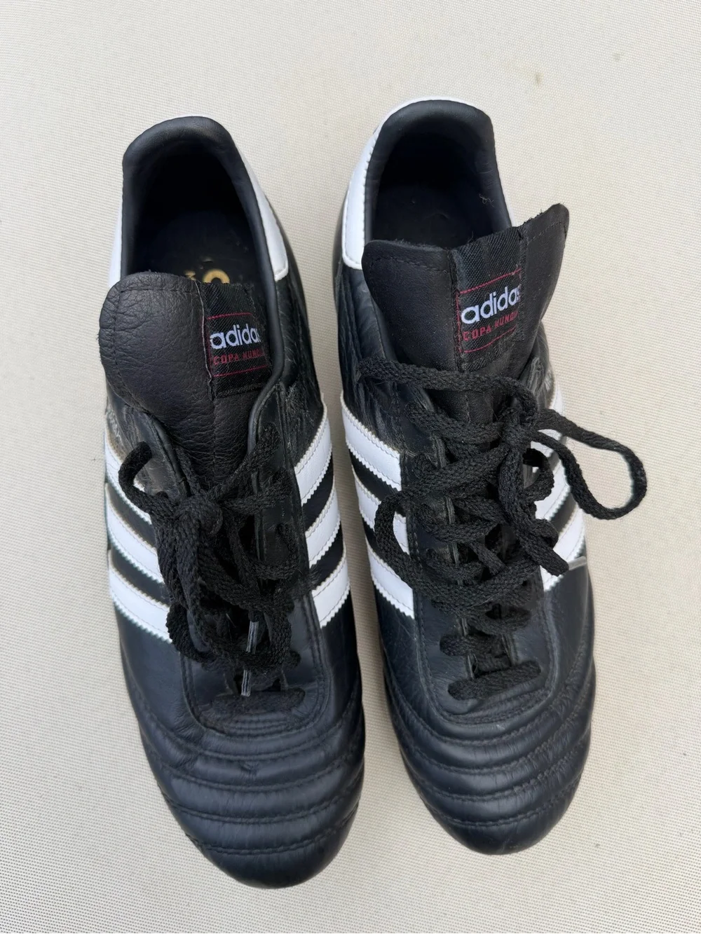 adidas Men’s Black and White Soccer Cleats